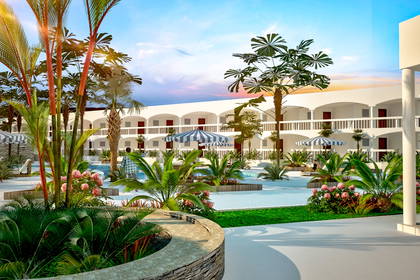 Resort z basenem, zielenią i dwupiętrowym budynkiem.